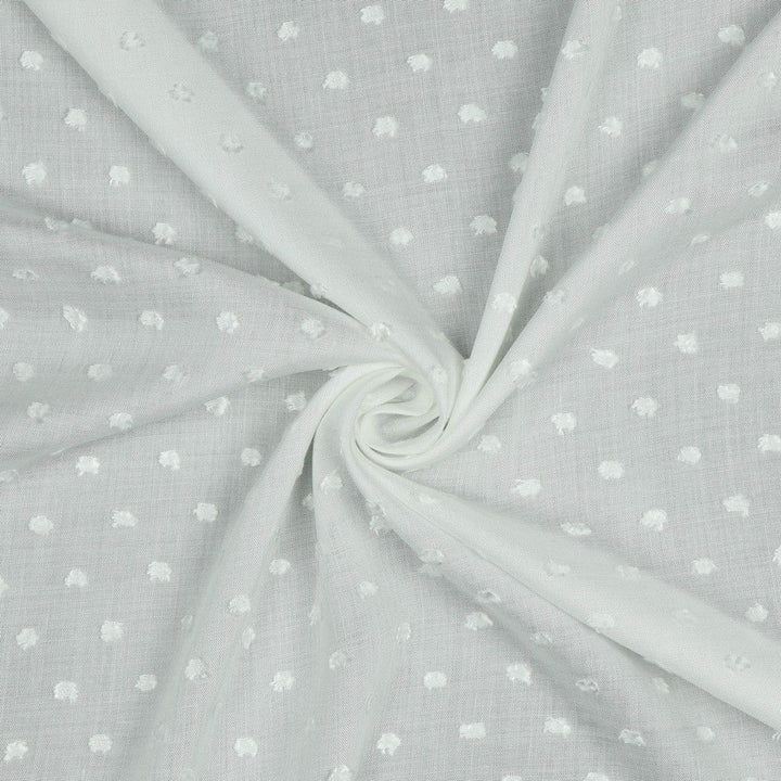 Viscose dobby textured spot polkadot dress fabric. Sage green and white