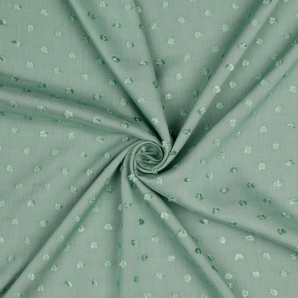 Viscose dobby textured spot polkadot dress fabric. Sage green and white