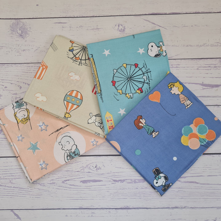 Peanuts and Snoopy Circus bundle of 4 cotton quilting fabrics.