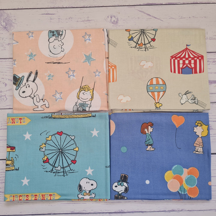 Peanuts and Snoopy Circus bundle of 4 cotton quilting fabrics.