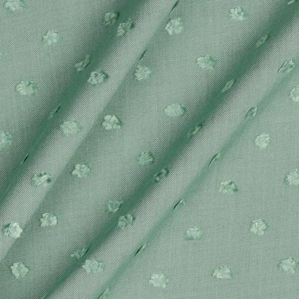 Viscose dobby textured spot polkadot dress fabric. Sage green and white