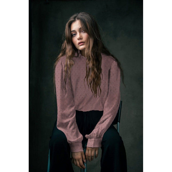 Viscose dobby textured spot polkadot dress fabric. Sage green and white