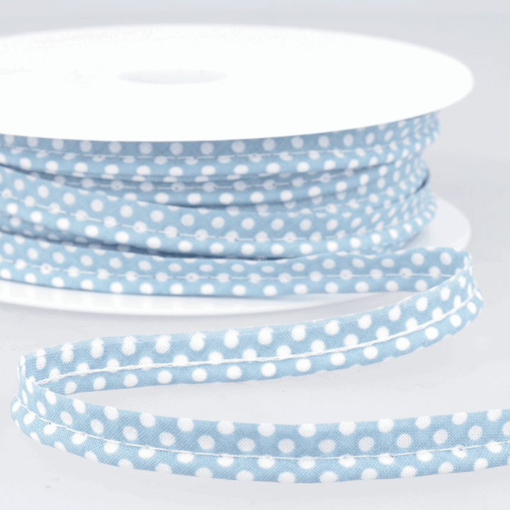 Patterned flanged 10mm wide piping cord trim 2 mm. Floral and polkadot trim. Per Metre