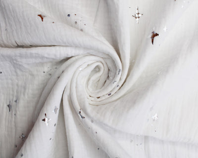 Silver metallic stars Cotton Double Gauze Muslin dress fabric by the half metre.