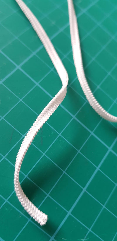 Flat braided elastic 3mm wide by the metre. White. Suitable for facemasks