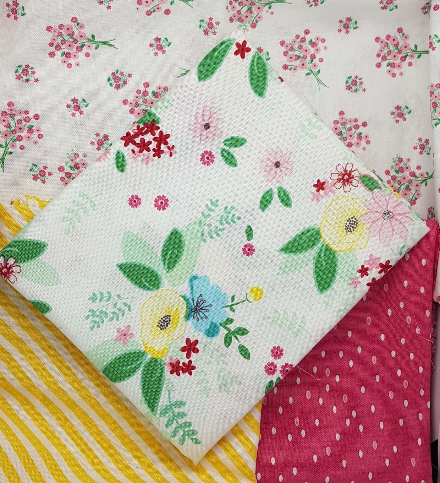 Singing in the Rain cotton fabrics: fat quarter bundle of 4 floral fabrics. Riley Blake.