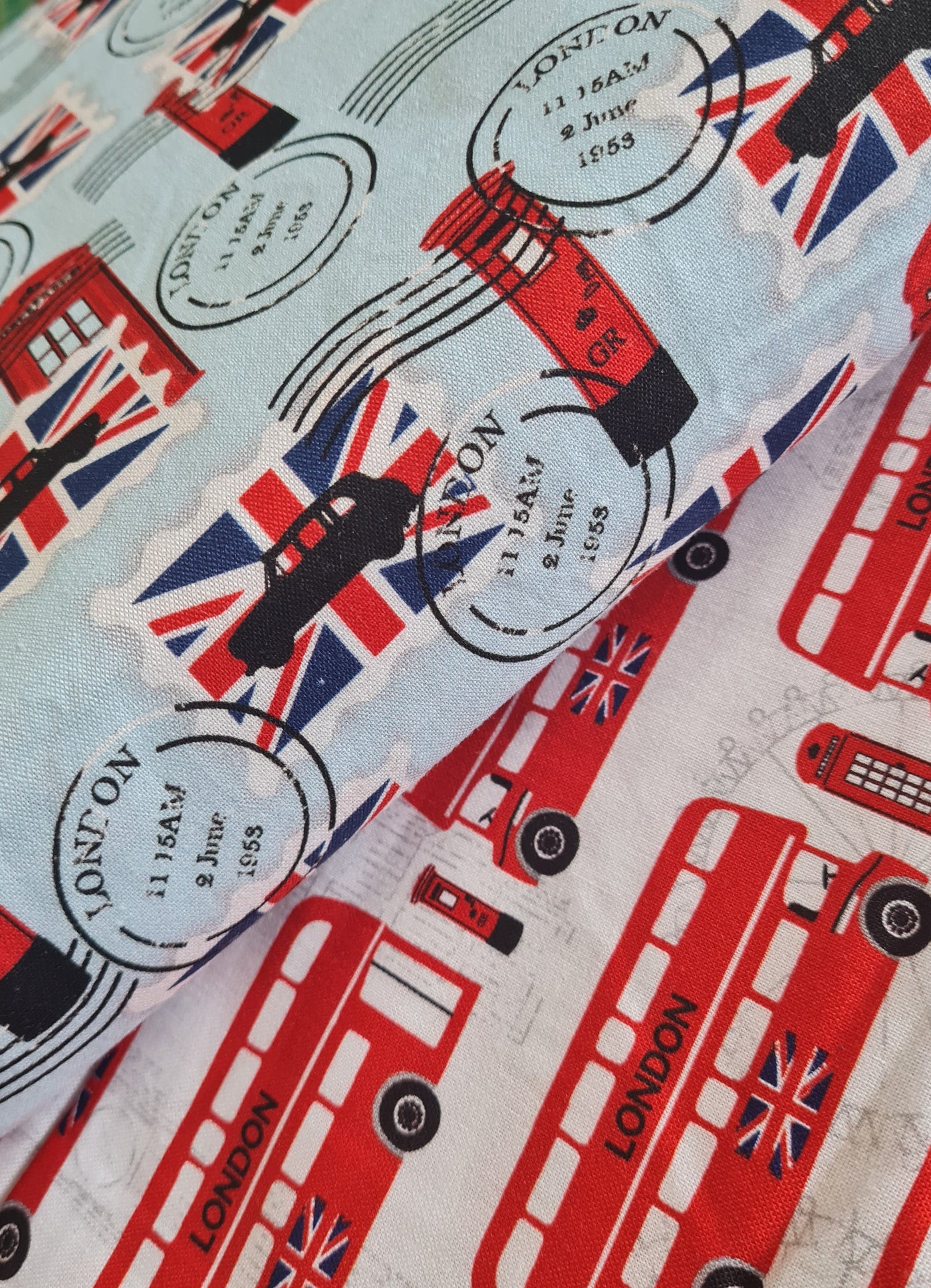 London buses, British stamps and Union Jacks. Queen Jubilee cotton quilting fabric.