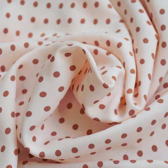 Polkadot Pois Eglantine nude 100% viscose woven dressmaking fabric. By Cousette.
