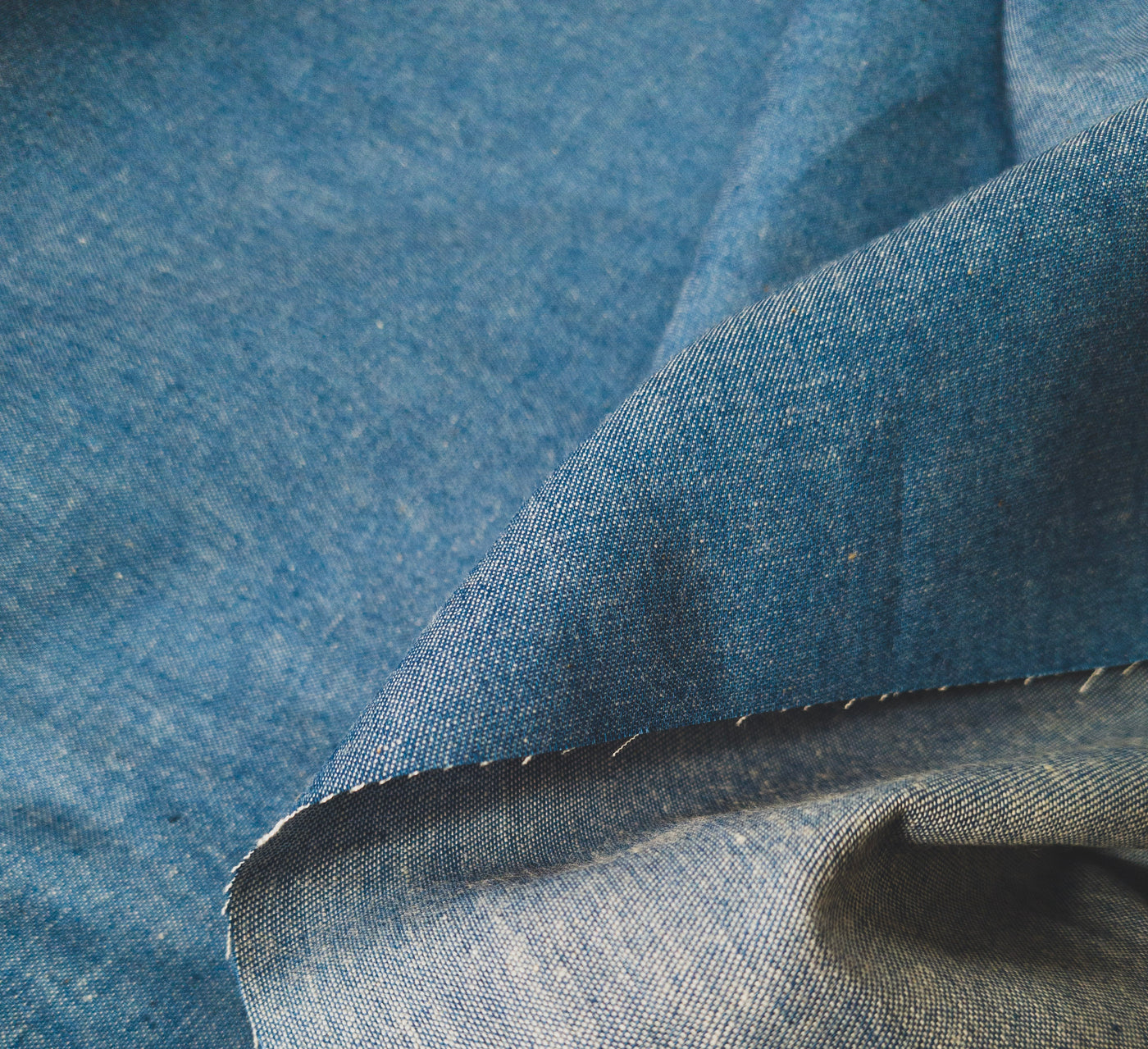 Mid Blue 100% Cotton Plain Washed Denim Chambray Chambre Fabric. By the half metre.