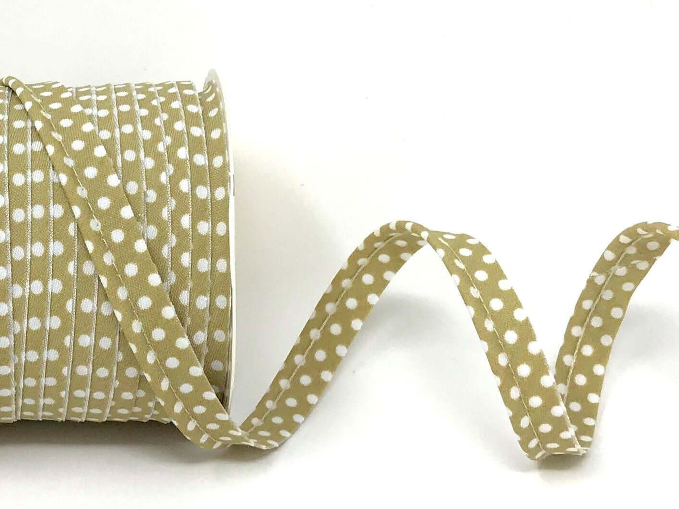Patterned flanged 10mm wide piping cord trim 2 mm. Floral and polkadot trim. Per Metre